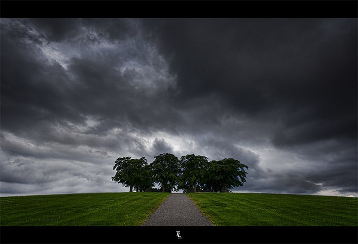 Storm clouds can add interest to a composition. Photo: The Pathway by Tobias Lindman